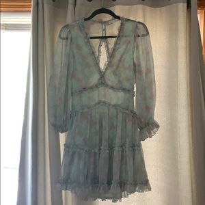 Saints and secrets open back dress